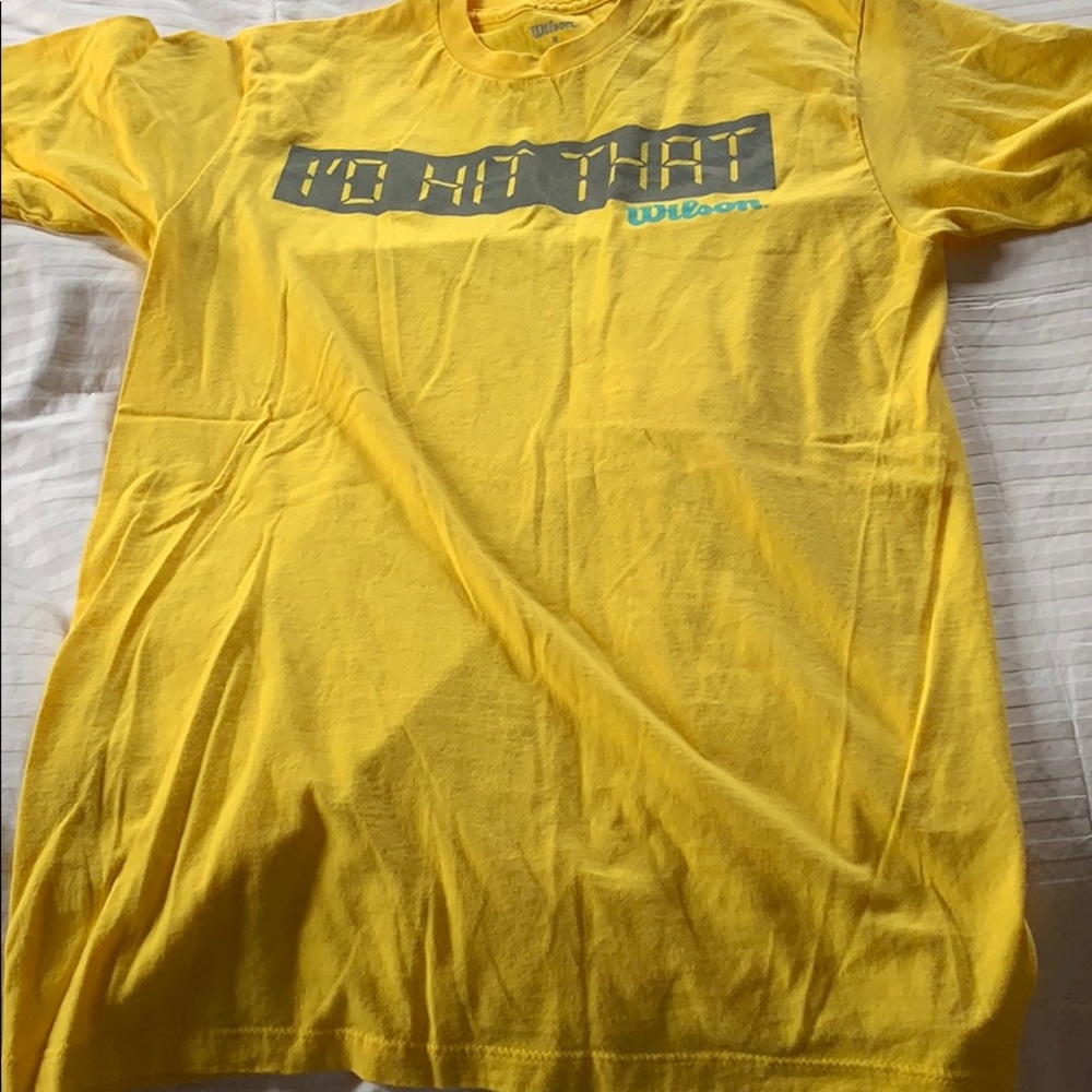 Wilson tennis t shirt.  Lists grand slam cities.